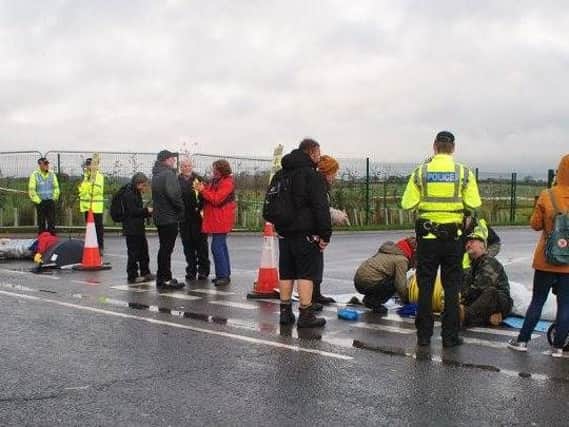 Police were called after protesters locked-on outside the site PIC: Ros Wills
