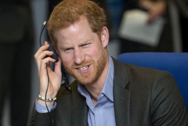 Prince Harry meets staff and veterans at Veterans UK in Lancashire, to mark the 25th anniversary of the Veterans UK Helpline Service.