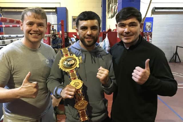 British super-lightweight champions Jack Catterall at Jennings Gym with former British welterweight champion Michael Jennings (right) and boxing trainer Dave Jennings