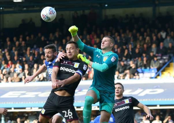 Sam Johnstone punches clear against Birmingham at the weekend