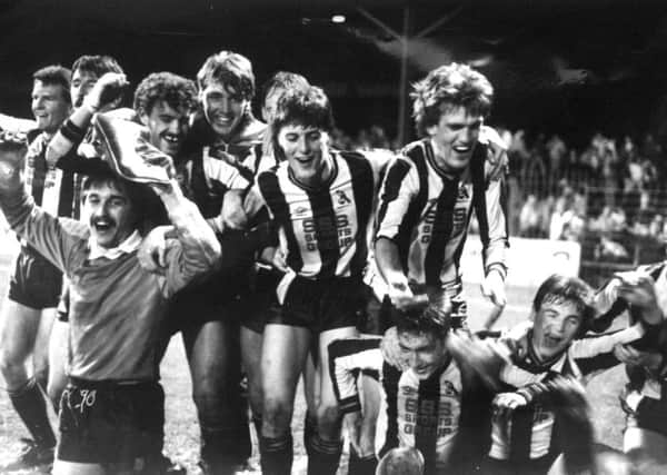 Jubilant Chorley players after they beat Wolves at Burnden Park in 1986