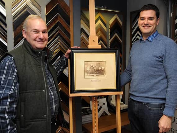 William Thompson, left, was united with a photo of his great-grandfather Thomas by Longridge Art & Framing owner, Adam Giddins, right.