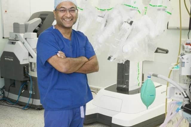 Arnab Bhowmick, divisional medical director of surgery at Lancashire Teaching Hospitals with the most advanced robotic surgeon, the DaVinci XI which is being funded by Rosemere Cancer Foundation's 20th anniversary appeal