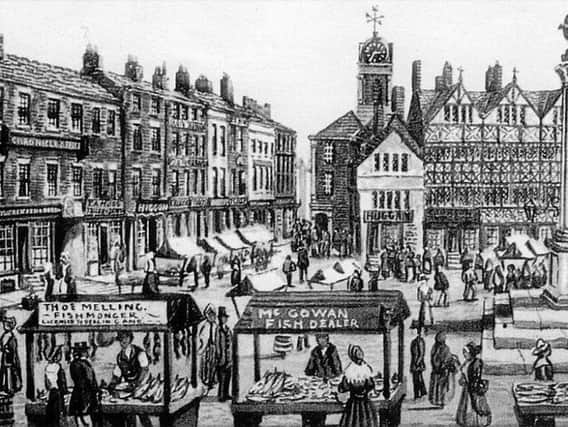 Market Place, Preston, in 1860 with the old Town Hall behind the timber framed properties