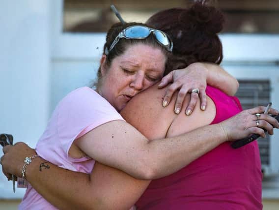 A man opened fire inside a church in a small South Texas community on Sunday, killing 26 people and wounding about 20 others in what the governor called the deadliest mass shooting in the state's history.