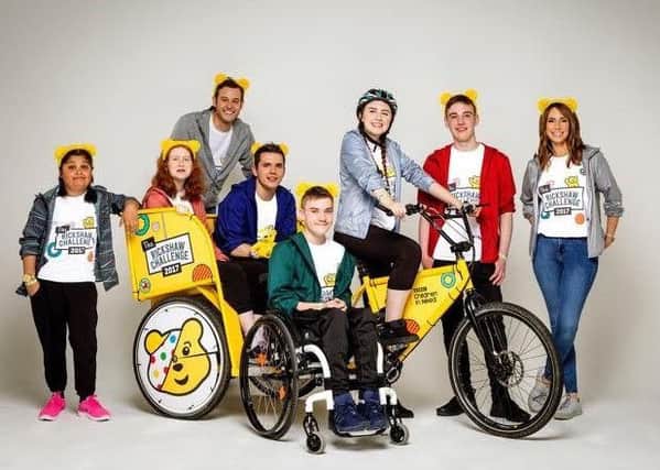 Matt Baker and Alex Jones with the Rickshaw Challenge team