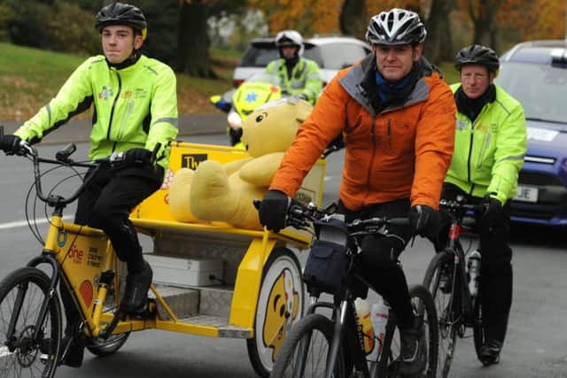 Matt Baker and the BBC Children In Need team on their Rickshaw Challenge passing through Preston