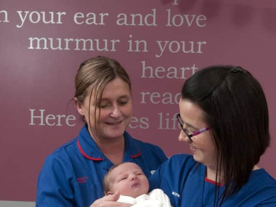 Cheryl Wyatt and Jane Cooper with Joshua, the 2310th baby born at Preston  Birth Centre
