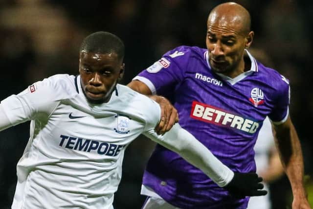Stephy Mavididi holds off Bolton midfielder Karl Henry
