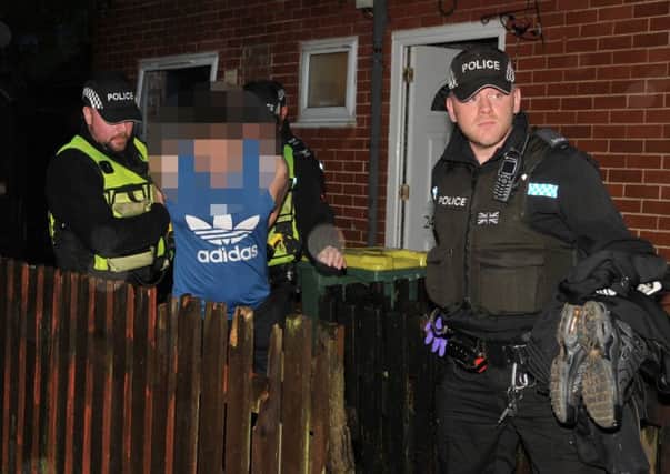 Photo Neil Cross
Police raid a house in Brookfield, Preston, during Operation Nexus
