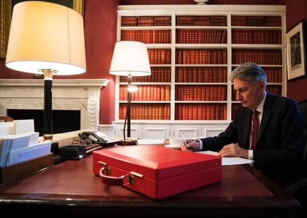Chancellor Philip Hammond prepares his 2017 Budget speech in his office in Downing Street