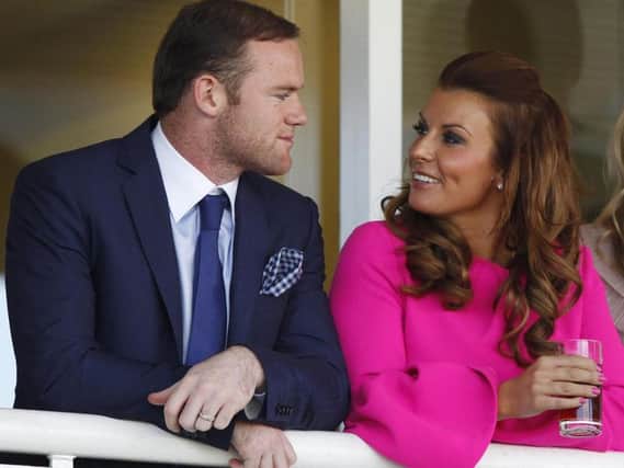 Wayne Rooney with his wife Coleen