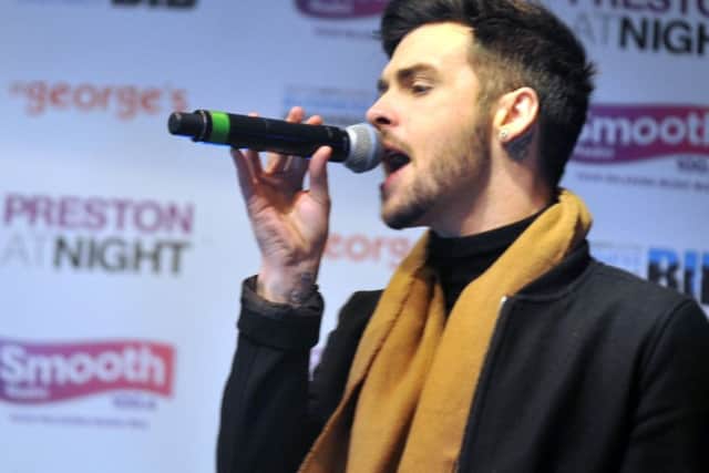 Boy band Union J perform on stage.