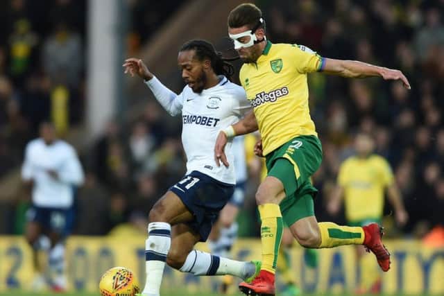 Daniel Johnson holds-off Ivo Pinto at Norwich
