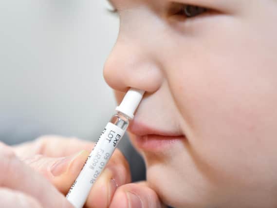 Doctors are appealing for parents to take up the free flu vaccination for children