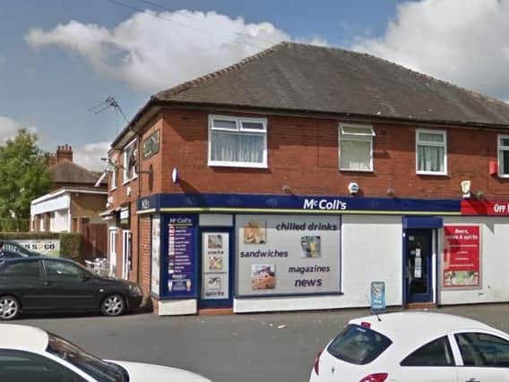 A man is reported to have entered the shop and threatened a 21-year-old shop worker with a Stanley knife before making off with cash from the til.