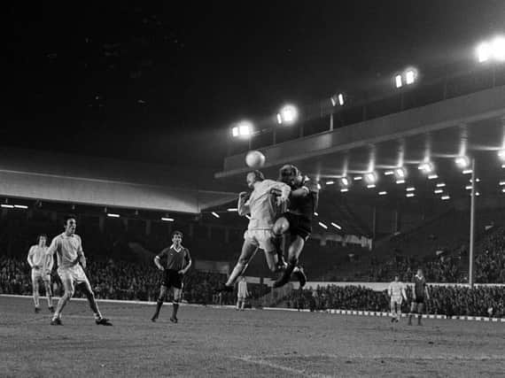 PNE striker John Smith challenges in the air against Crewe at Anfield in 1976