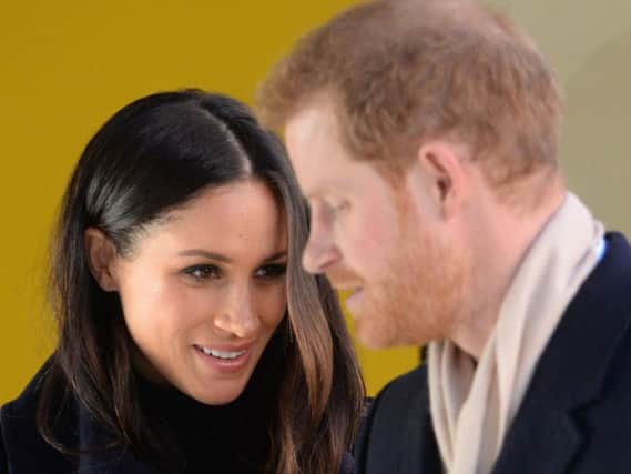 Meghan and Harry on their first official engagement on Friday