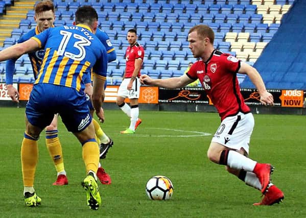 Adam Campbell looks for an opening at Shrewsbury on Saturday.