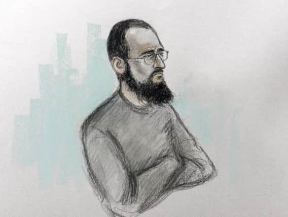Court artist sketch by Elizabeth Cook of Husnain Rashid in the dock at Westminster Magistrates' Court in London, where he appeared accused of helping would-be terrorists prepare attacks, including by sharing a photo of Prince George and his school address on social media