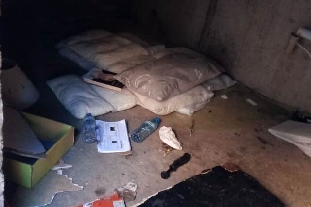 Heartbreaking pictures show the squalid and dangerous conditions a vulnerable homeless person is forced to sleep in as temperatures plunge to below freezing.
The shocking pictures of a tiny concrete electricity cupboard - directly underneath Preston's busiest road, the A59 Ringway