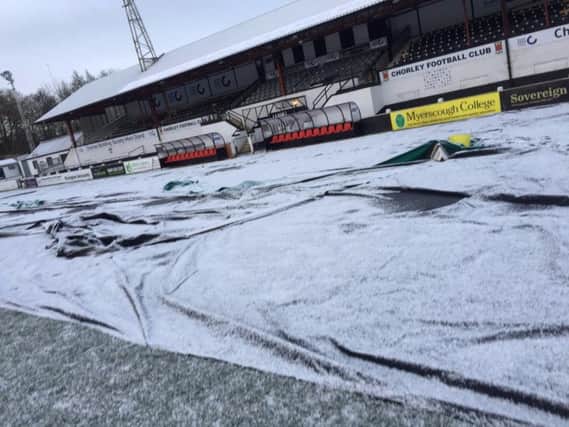 The pitch covers are staying on at Victory Park. Photo: Ian/@iw1963