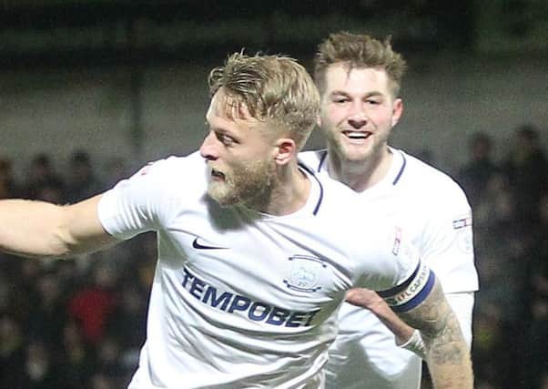 Tom Clarke sets off to celebrate after scoring for PNE at Burton on Saturday