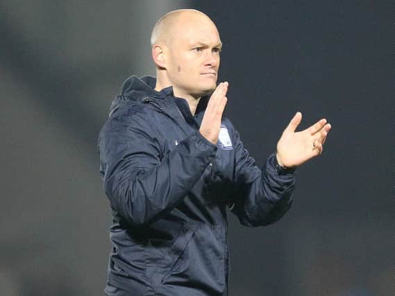 Alex Neil salutes the PNE fans after the win at Burton.