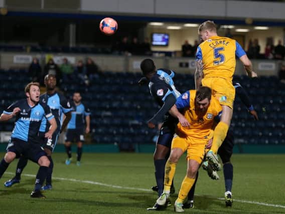 Tom Clarke in action against Wycombe in the FA Cup in November 2013