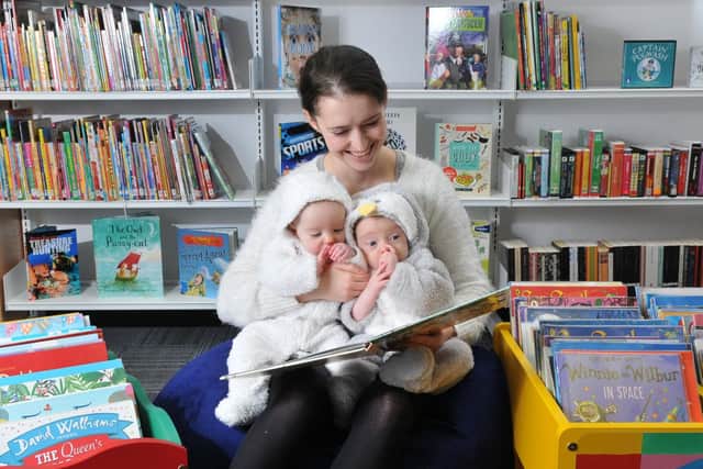 Fulwood library's two new members - twins  Tilly and Stanley Jones with mum Gemma.