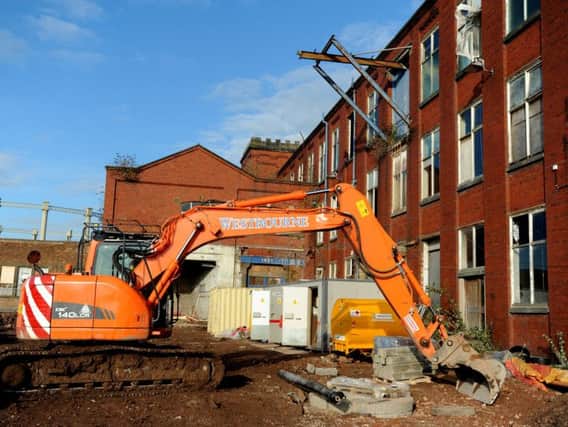Demolition takes place at the former Manchester Mill on Geoffrey Street