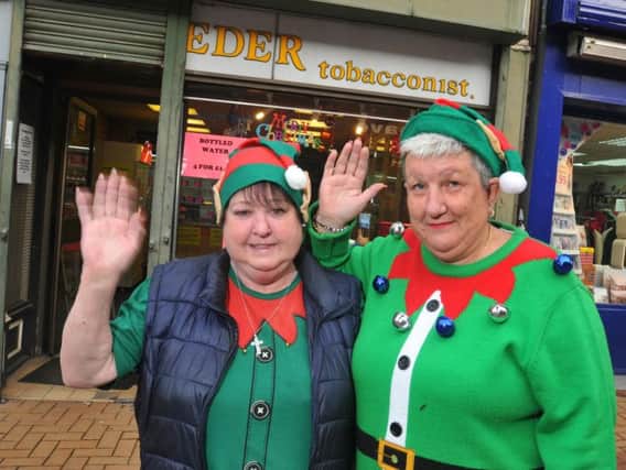 Linda Mitchell and Sandy Perkins from Reeders Tabacconists in Chapel Street, Chorley, get ready to close the shop after 147 years in business.