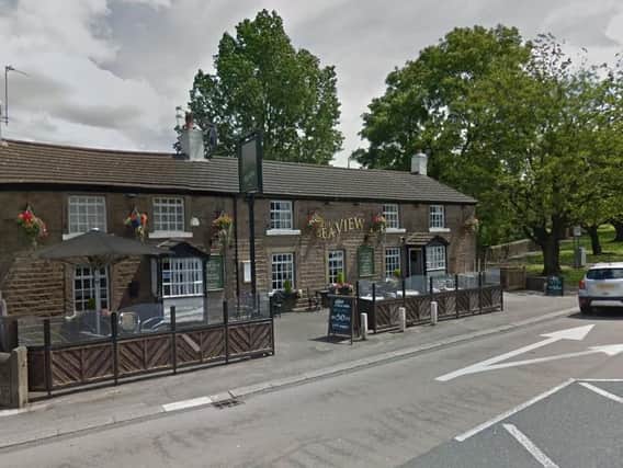 The robbery happened when two men broke in through the rear door of The Sea View, Preston Road at Whittle le Woods.