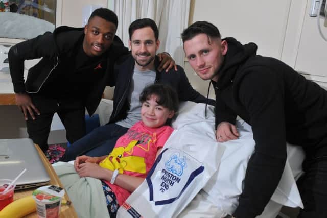 Mia Sleaford with Darnell Fisher, Greg Cunningham and Alan Browne.