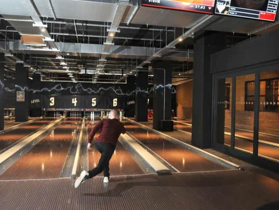 The new entertainment complex includes a bowling alley