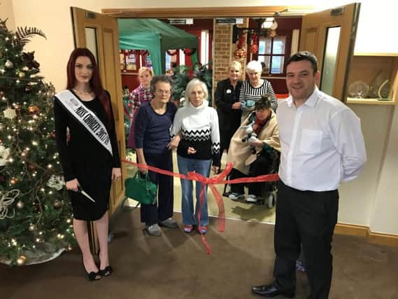 Becky Lizz, the reigning Miss Chorley opened the Christmas Market, in Market Square, The Lodge, in Buckshaw Retirement Village.