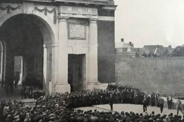 Nearly three thousand Leyland workers assemble next to the Menin Gate Memorial to the Missing