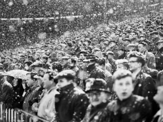 Spectators brave the wintry weather