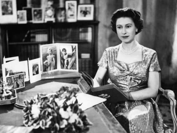 Queen recording her Christmas Day message to the Commonwealth in the Long Library at Sandringham in 1957