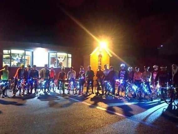 Cyclists decked in Christmas lights and fancy dress set out for a ride around Croston.