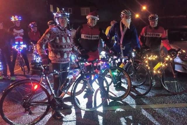 Cyclists decked in Christmas lights and fancy dress set out for a ride around Croston.