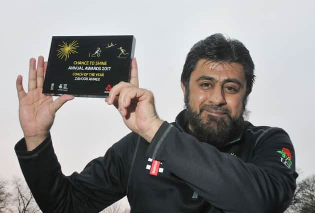 Zahoor Ahmed with his Chance to Shine coach of the year award