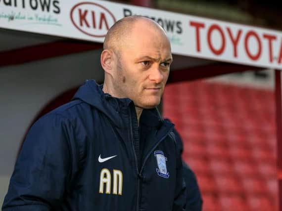 Alex Neil looks on at Oakwell.