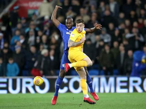 Jordan Hugill battles with Cardiff captain Sol Bamba.