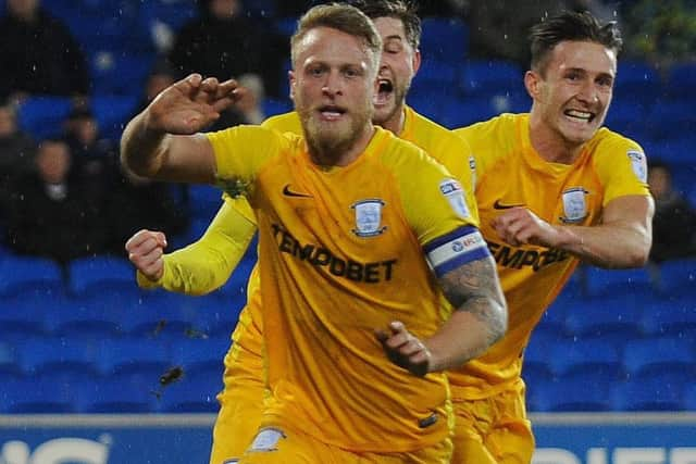 Tom Clarke celebrates scoring PNEs winner at Cardiff