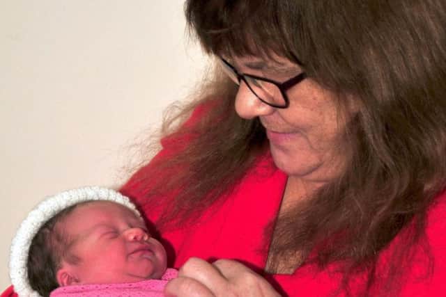 Sophia Hackney was born New Years Eve at 11:33pm, weighing 6lb 15oz, to Stephanie Mason and Michael Hackney. Here she is pictured with Grandma Carole Mason.