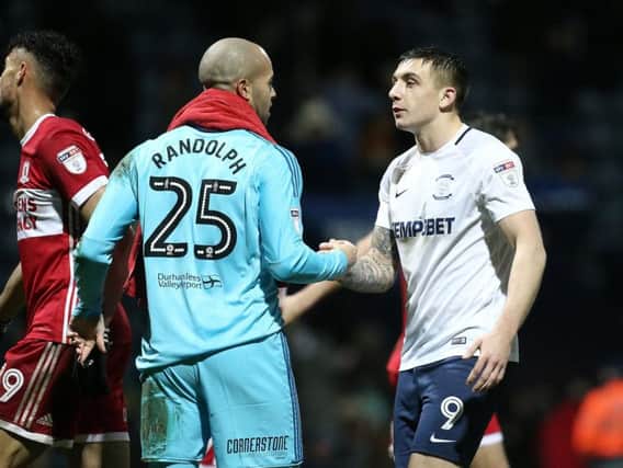 Jordan Hugill shakes hands with Middlesbrough goalkeeper Darren Randolph at the final whistle.