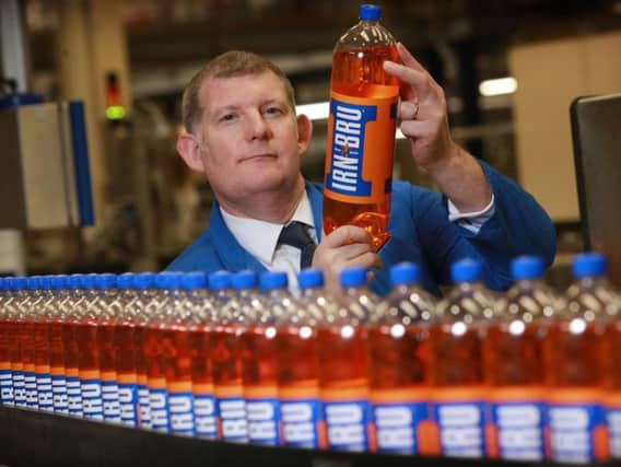 Chief Executive Roger White at the company's factory in Cumbernauld