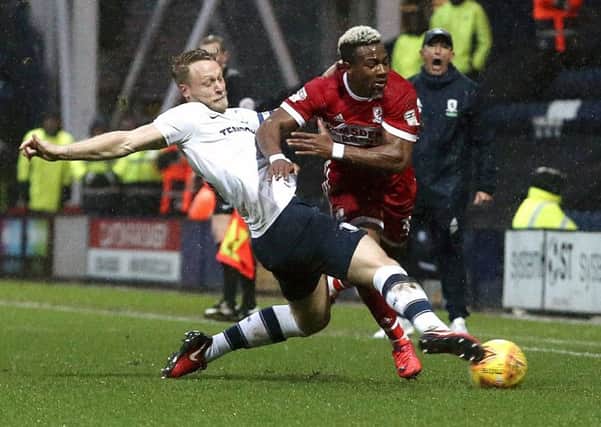 Middlesbrough's Adama Traore is tackled by North End's Tom Clarke on New Year's Day