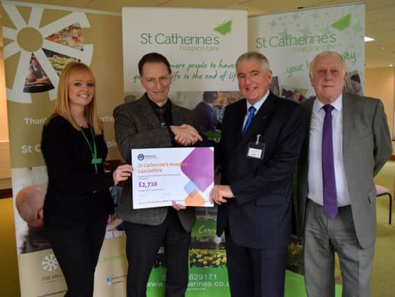 Chris Blackwell and Jeff Lucas present a cheque to Stephen Greenhalgh and Hollie Dring of St Catherine's Hospice